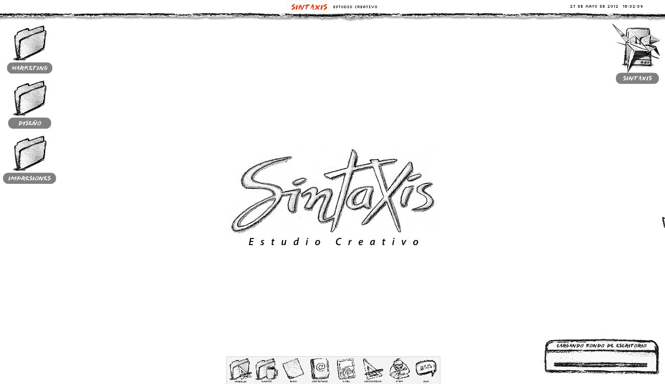 The way in: a blank screen and a bar that reads "loading desktop wallpaper" — Sintaxis